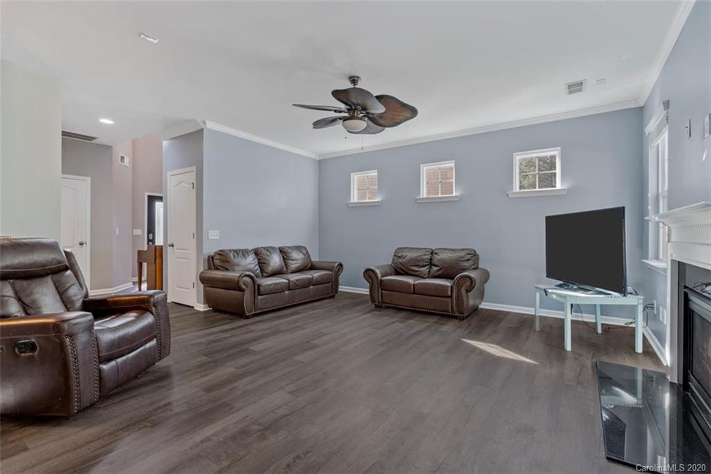 78106 Rillstone Drive Lancaster, SC 29720 - Photo 14 of 43 a living room with furniture and a flat screen tv