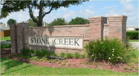 16811 Anna Green Street Houston, TX 77084 - Photo 1 of 27 a sign on the side of a building