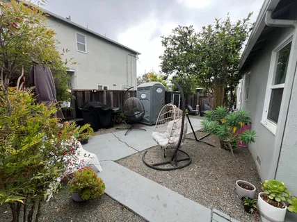 a backyard of a house with lots of green space