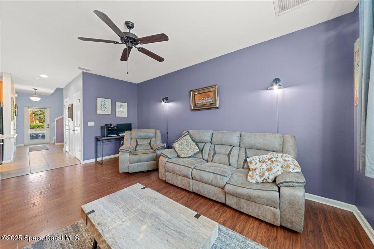 1345 Lara Circle, Unit 102 Rockledge, FL 32955 - Photo 17 of 34 a living room with furniture