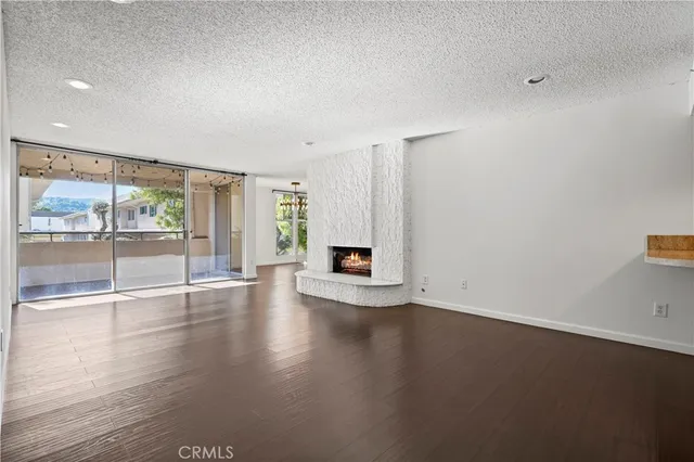 a view of living room and kitchen