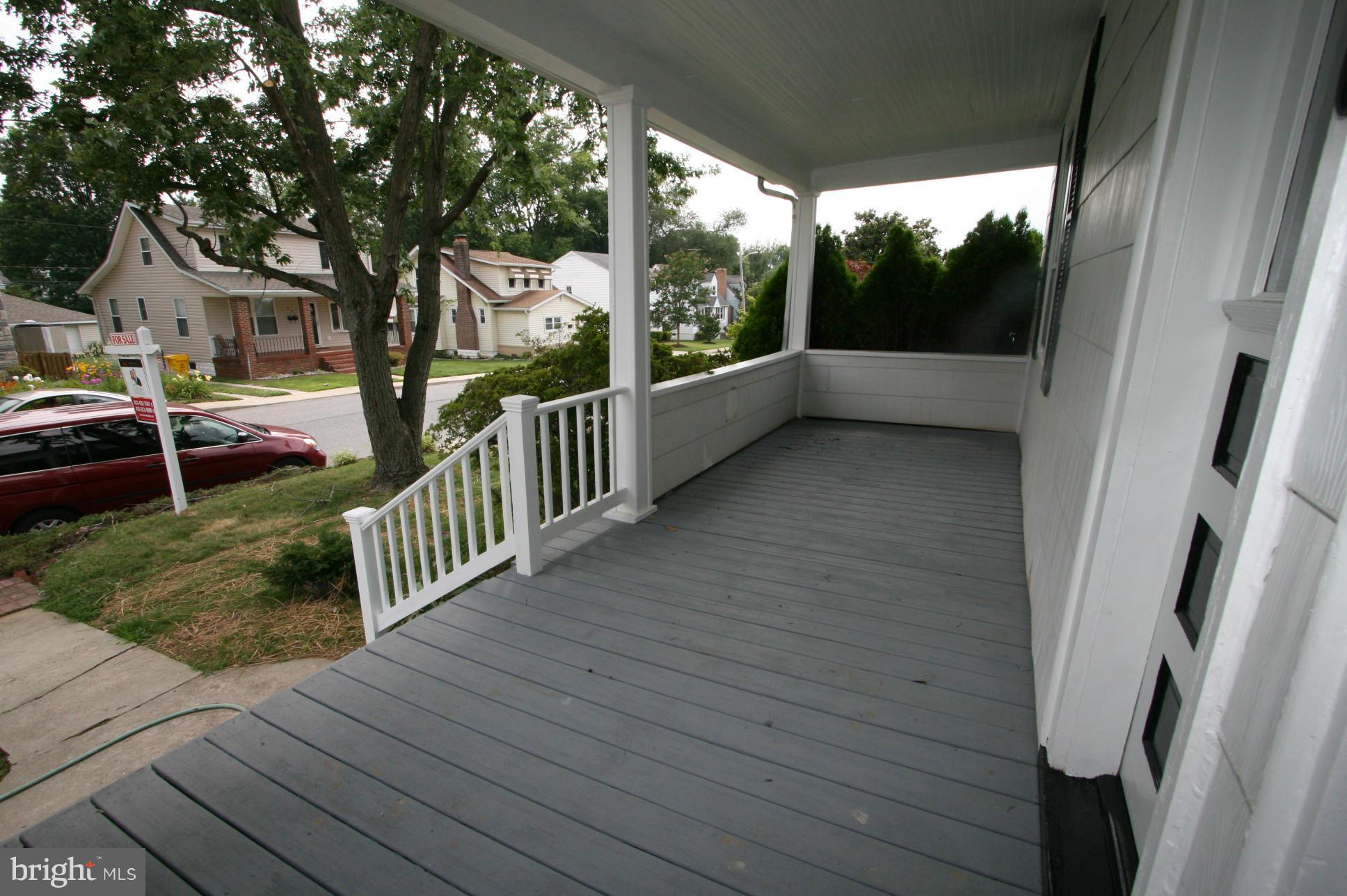 500 Cleveland Road Linthicum Heights, MD 21090 - Photo 24 of 26 a view of house with wooden deck and garden