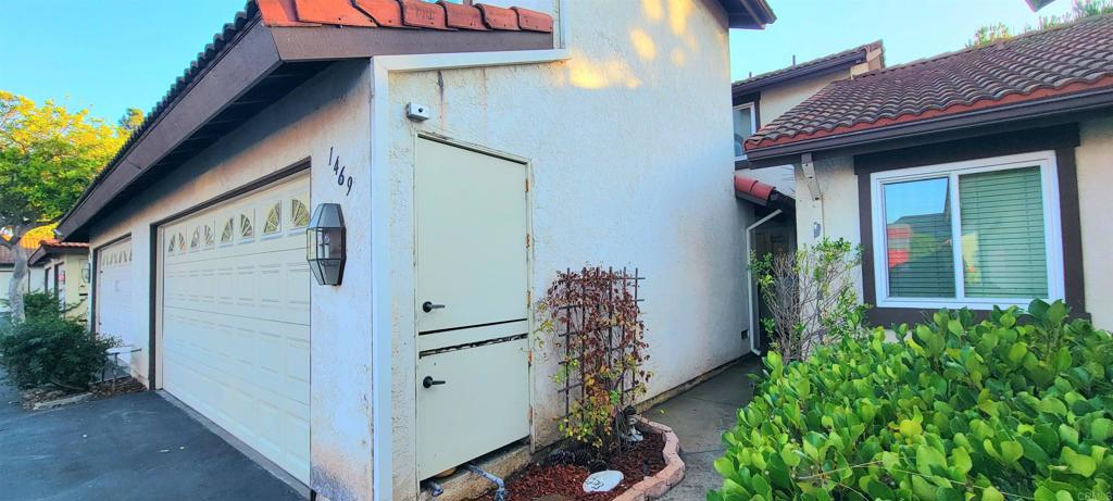 1469 Sundance Way Oceanside, CA 92057 - Photo 22 of 27 a house with trees in front of it