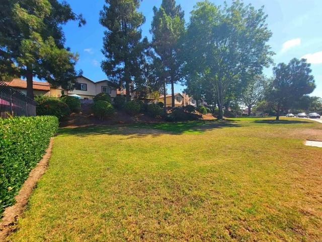 a view of a swimming pool with an outdoor space and seating area