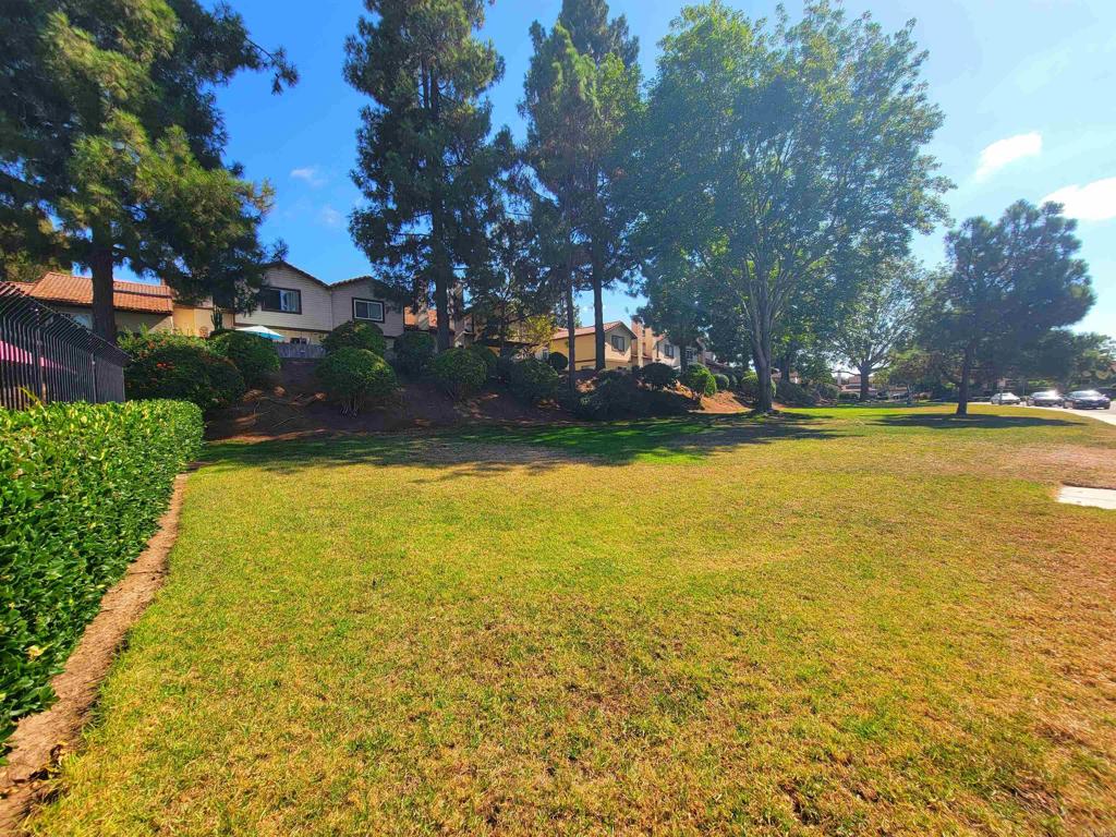 1469 Sundance Way Oceanside, CA 92057 - Photo 27 of 27 a view of a swimming pool with an outdoor space and seating area