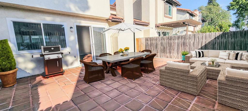 1469 Sundance Way Oceanside, CA 92057 - Photo 8 of 27 a outdoor space with patio furniture and potted plants