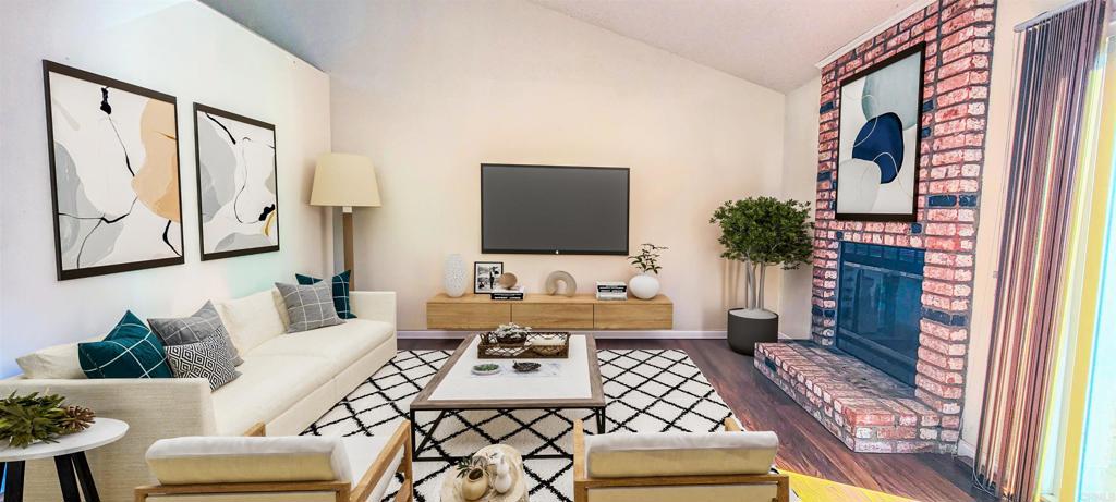 1469 Sundance Way Oceanside, CA 92057 - Photo 9 of 27 a living room with furniture and a flat screen tv