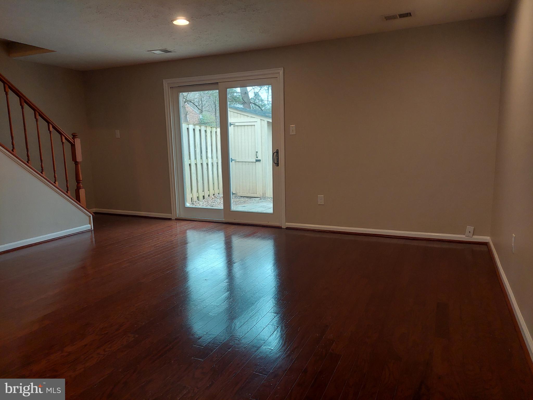 10149 Shelldrake Circle Damascus, MD 20872 - Photo 30 of 73 a view of empty room with wooden floor and fan