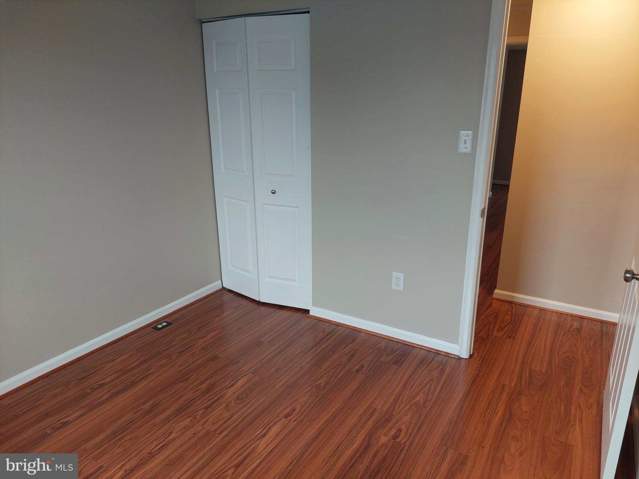 10149 Shelldrake Circle Damascus, MD 20872 - Photo 40 of 73 a view of an empty room with wooden floor