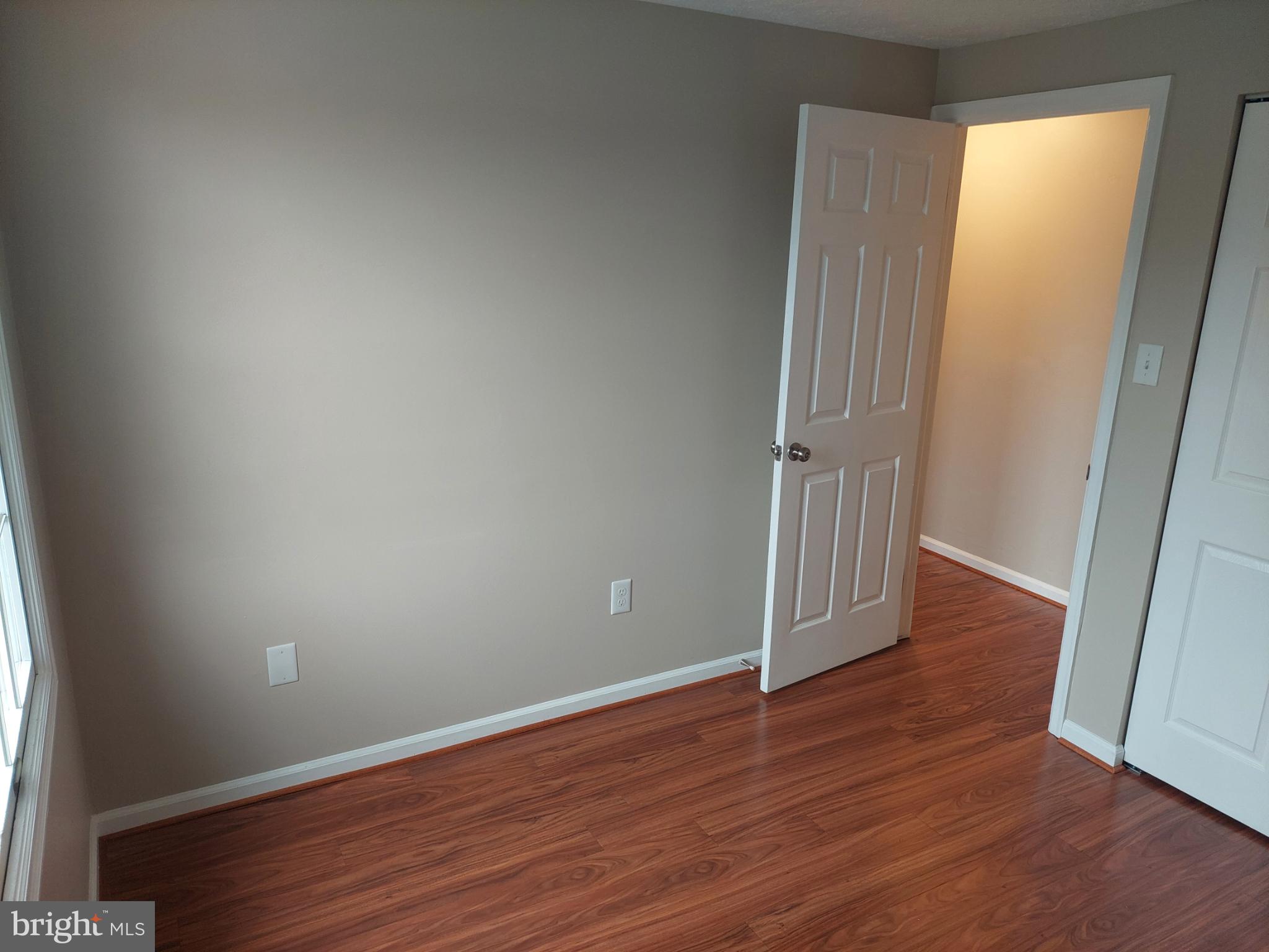 10149 Shelldrake Circle Damascus, MD 20872 - Photo 46 of 73 an empty room with wooden floor and closet