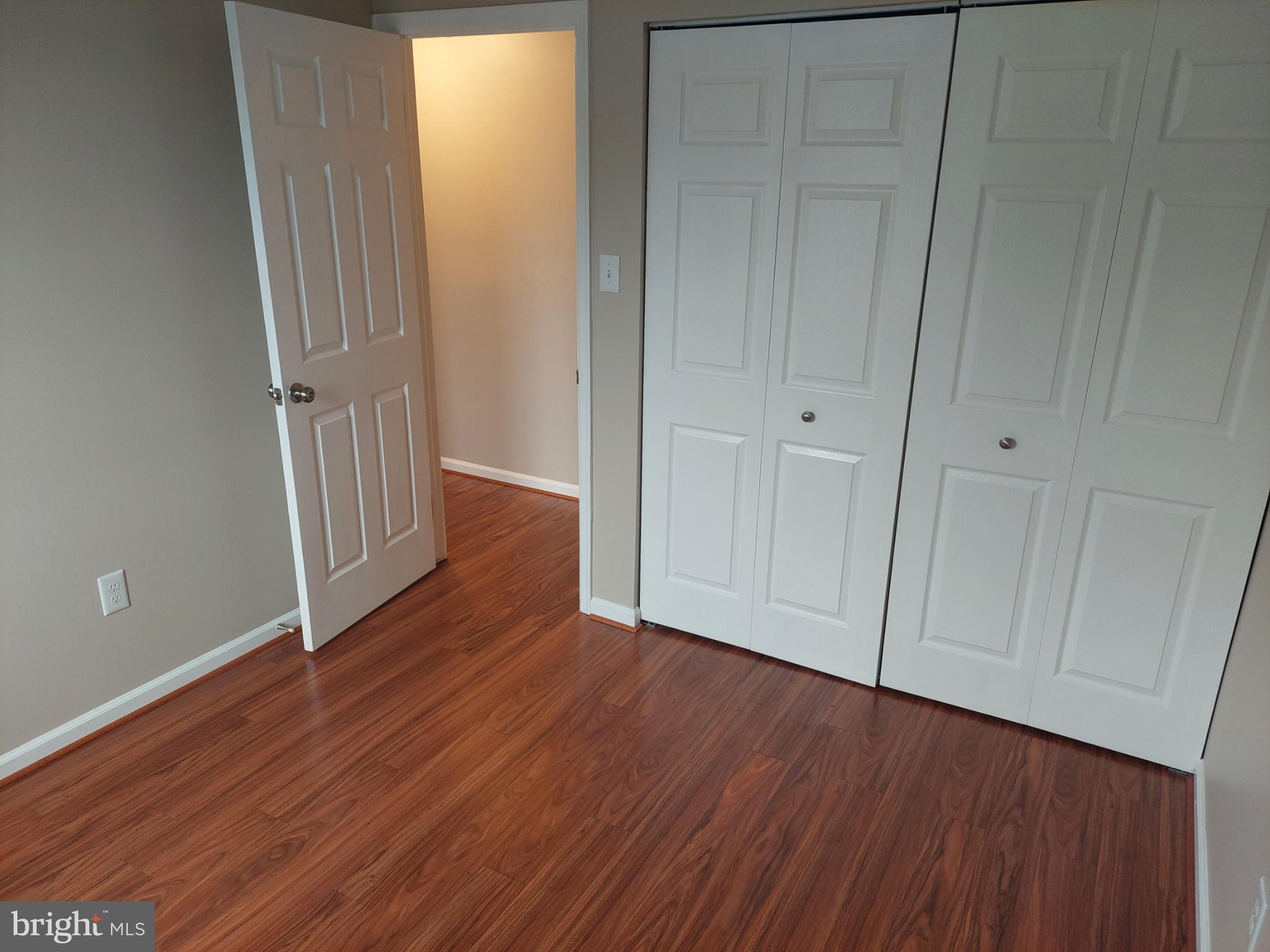 10149 Shelldrake Circle Damascus, MD 20872 - Photo 47 of 73 a view of a hallway with wooden floor