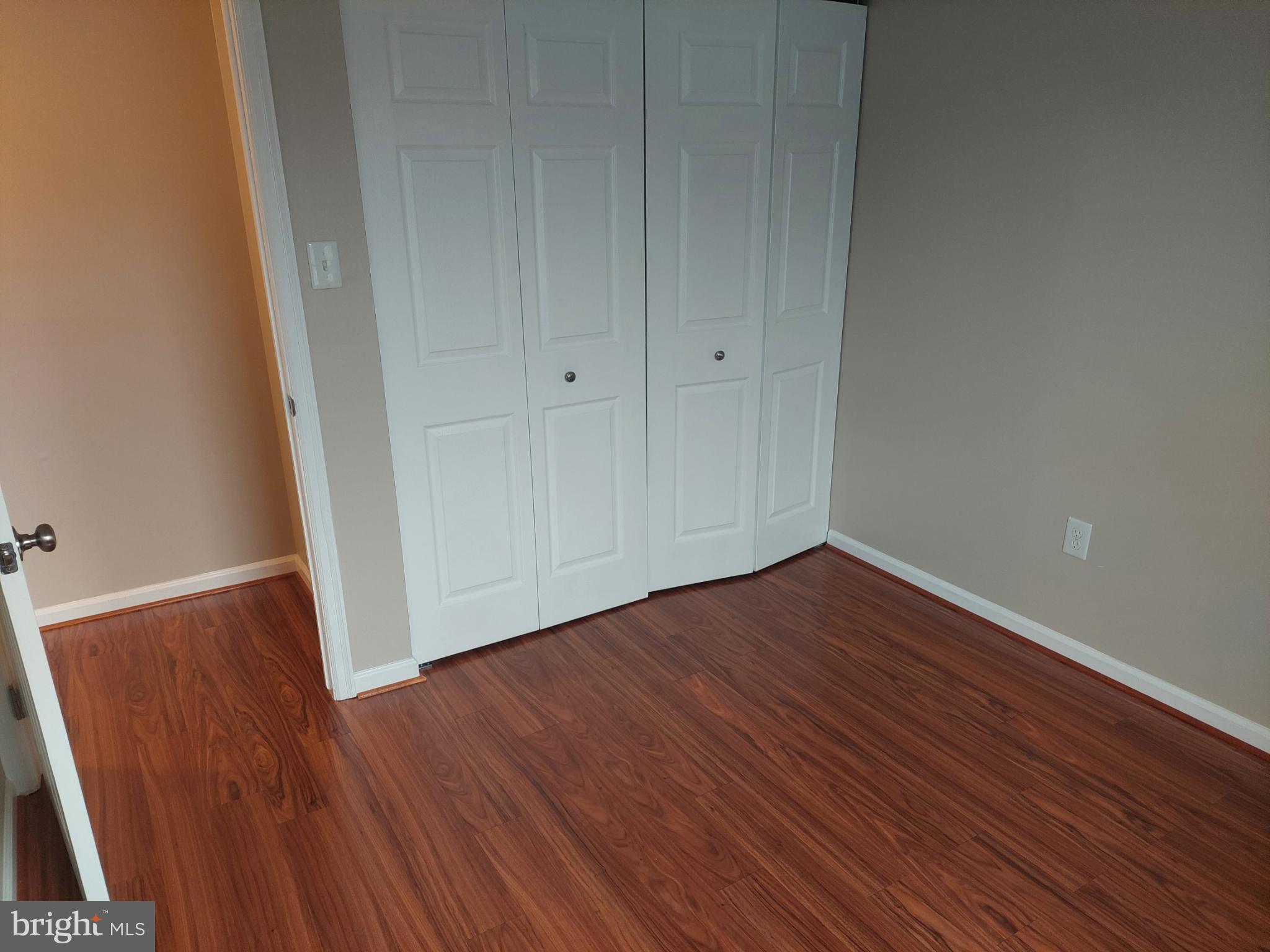 10149 Shelldrake Circle Damascus, MD 20872 - Photo 48 of 73 a view of an empty room with wooden floor