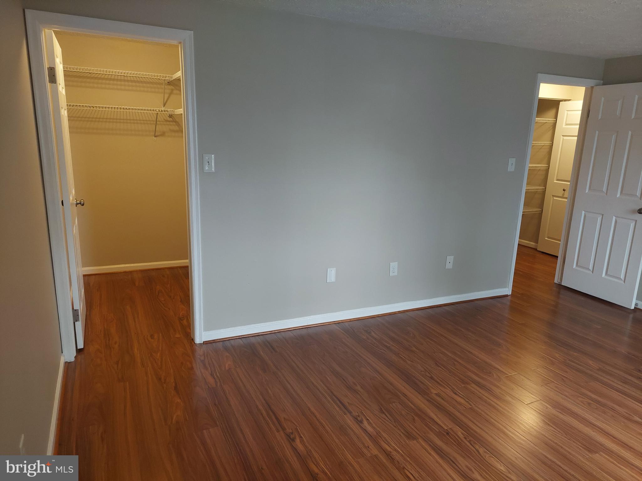 10149 Shelldrake Circle Damascus, MD 20872 - Photo 63 of 73 an empty room with wooden floor and a window