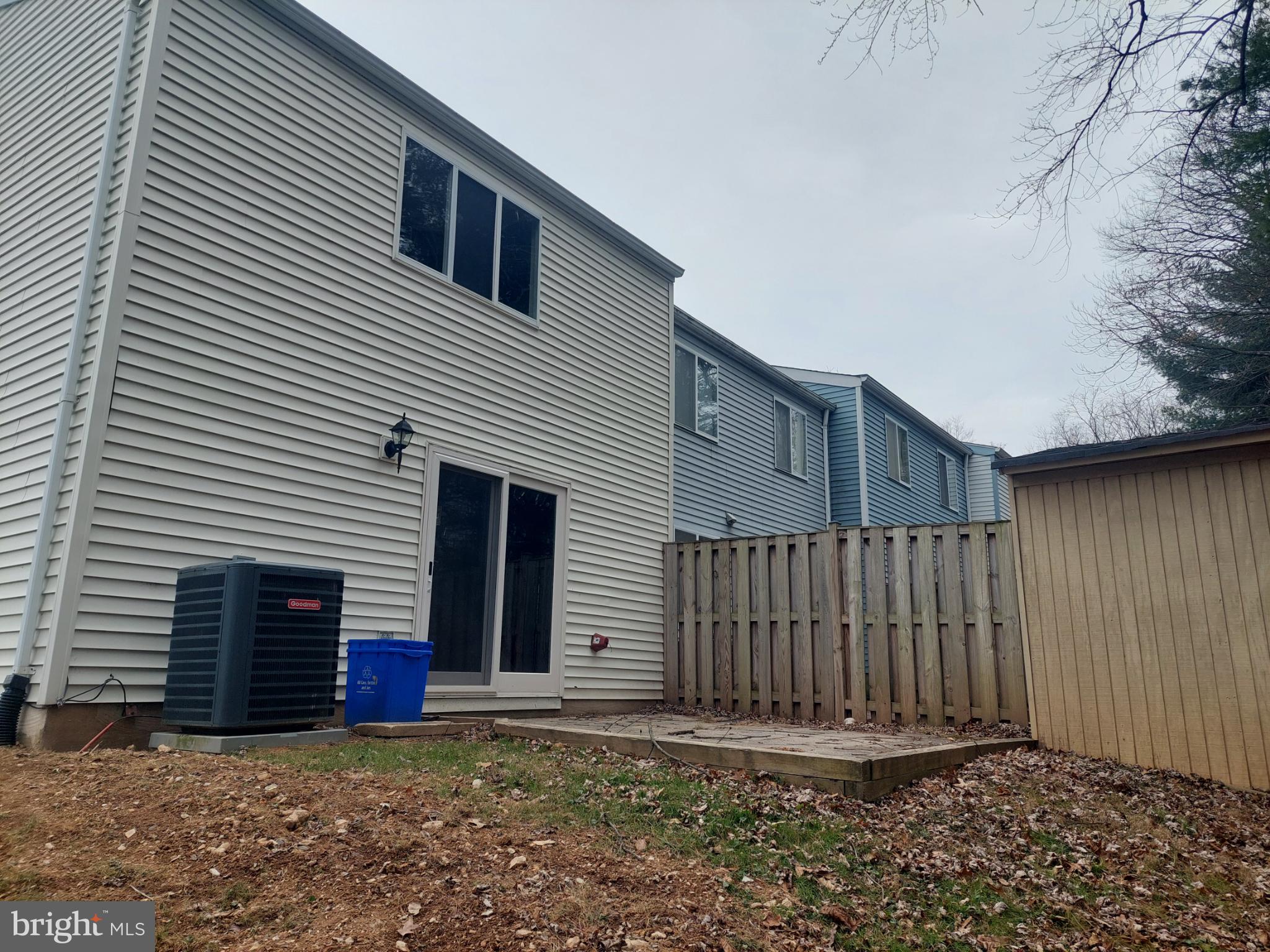 10149 Shelldrake Circle Damascus, MD 20872 - Photo 70 of 73 a view of a house with a small yard and large tree