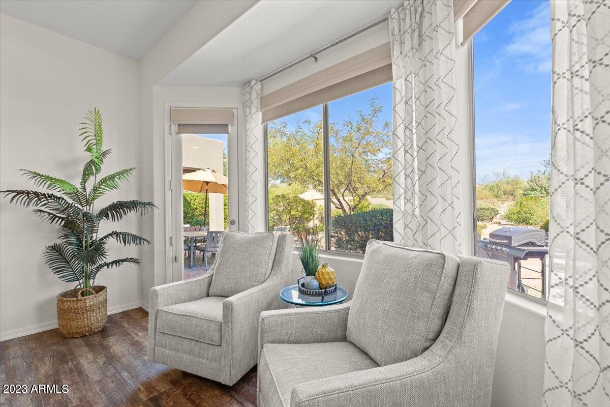 14257 North 106th Place Scottsdale, AZ 85255 - Photo 28 of 58 a living room with furniture and a large window