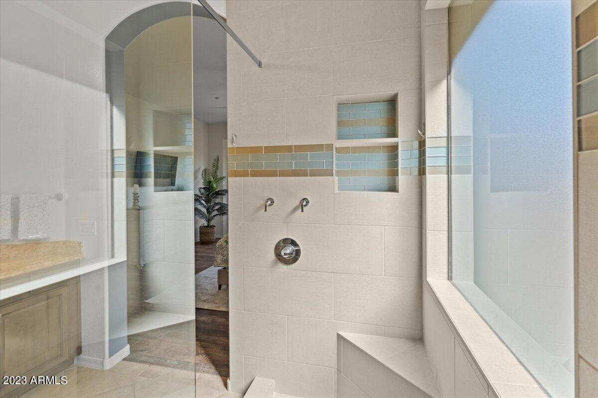 14257 North 106th Place Scottsdale, AZ 85255 - Photo 33 of 58 a bathroom with a shower
