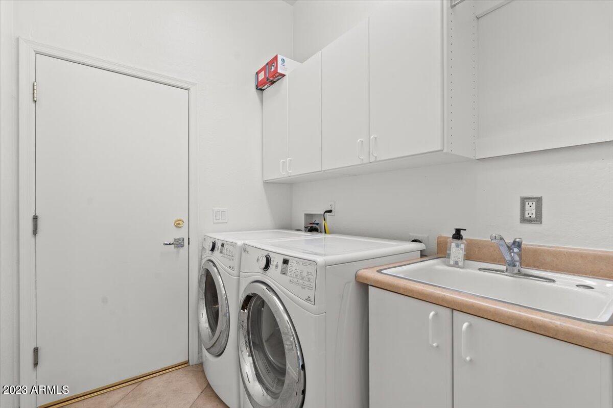 14257 North 106th Place Scottsdale, AZ 85255 - Photo 38 of 58 a utility room with dryer and washer