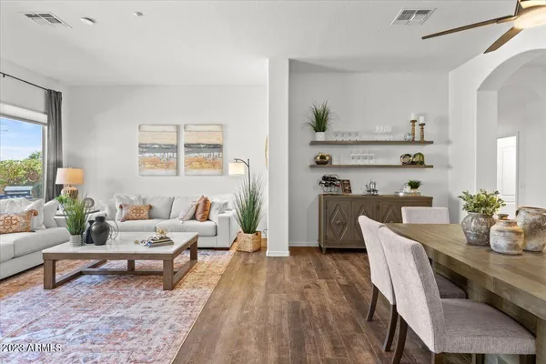a view of a house with a mountain in the background