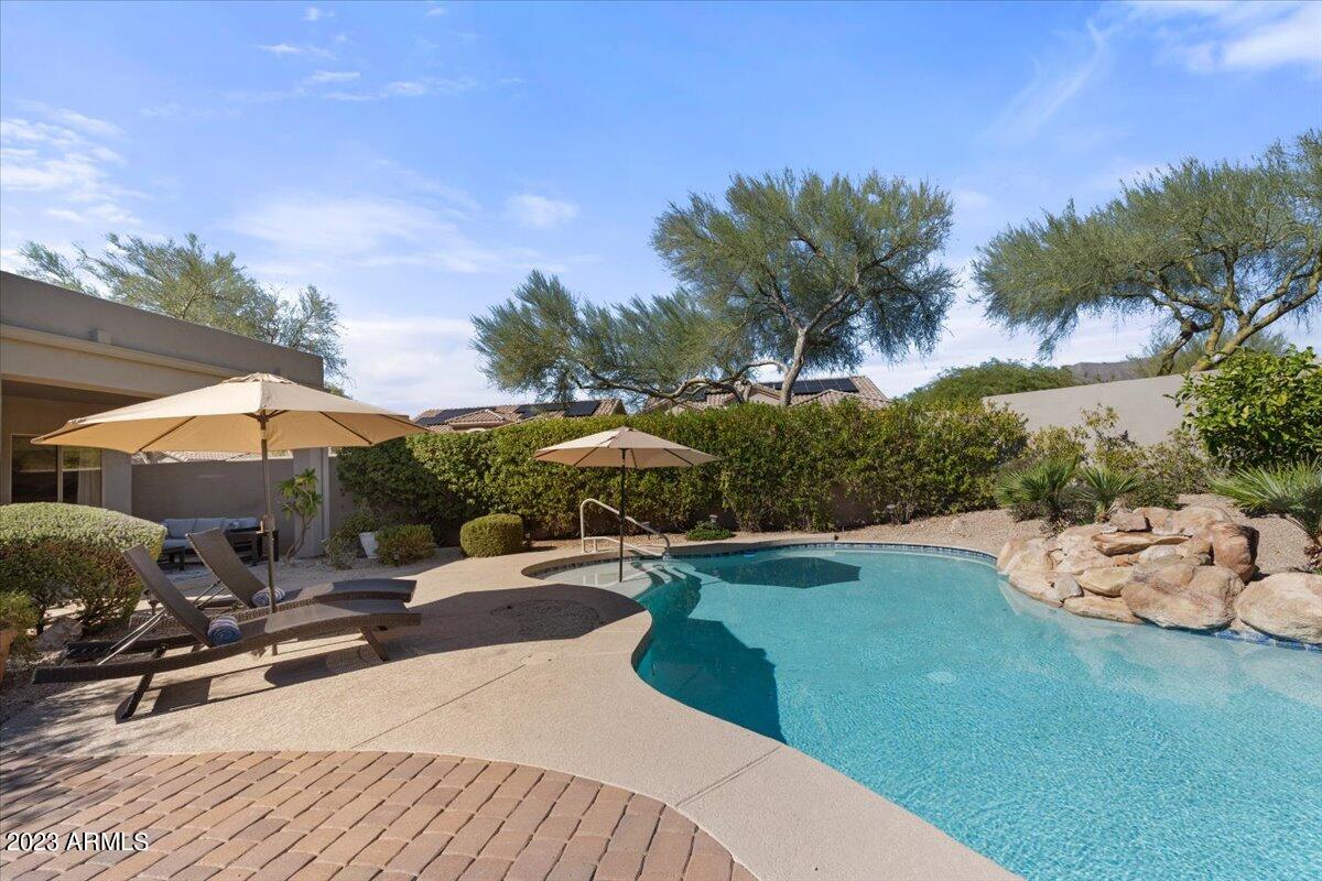 14257 North 106th Place Scottsdale, AZ 85255 - Photo 51 of 58 a view of a backyard with sitting area