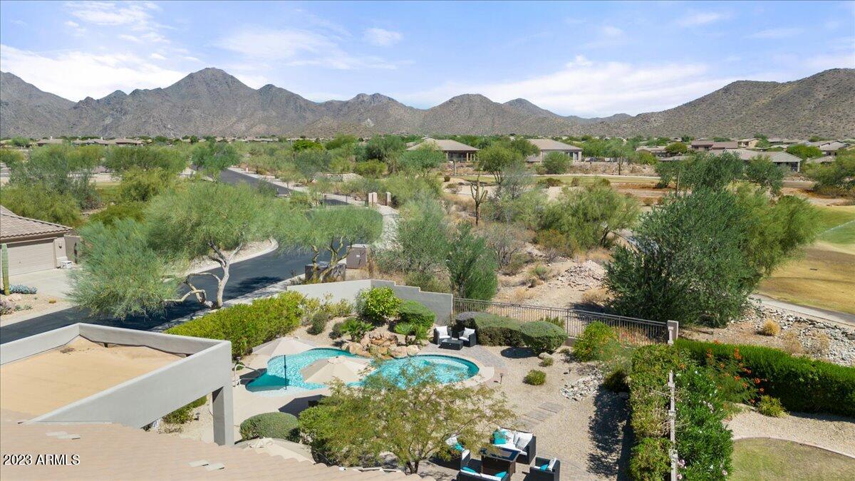 14257 North 106th Place Scottsdale, AZ 85255 - Photo 56 of 58 a view of a lake with a mountain in the background