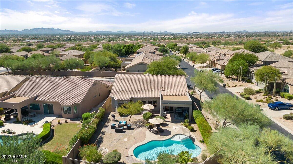 14257 North 106th Place Scottsdale, AZ 85255 - Photo 58 of 58 an aerial view of a house with yard swimming pool and lake view