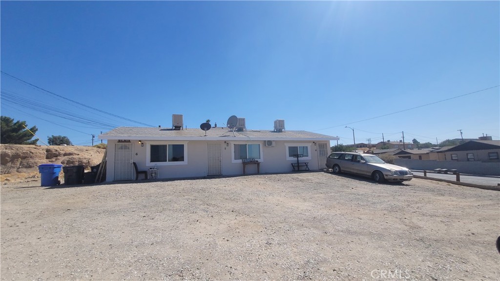 335 Barstow Road Barstow, CA 92311 - Photo 1 of 1 a view of a house with a outdoor space
