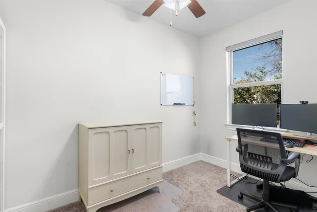a bathroom with a shower and a sink