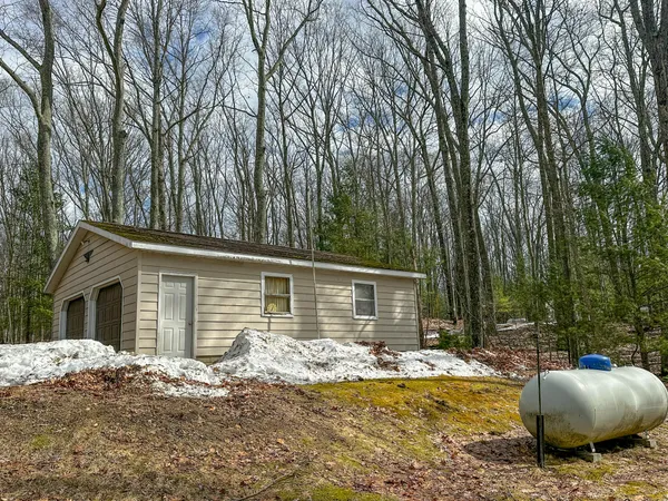 $269,900 | 8827 West Elbow Drive, Irons, MI 49644