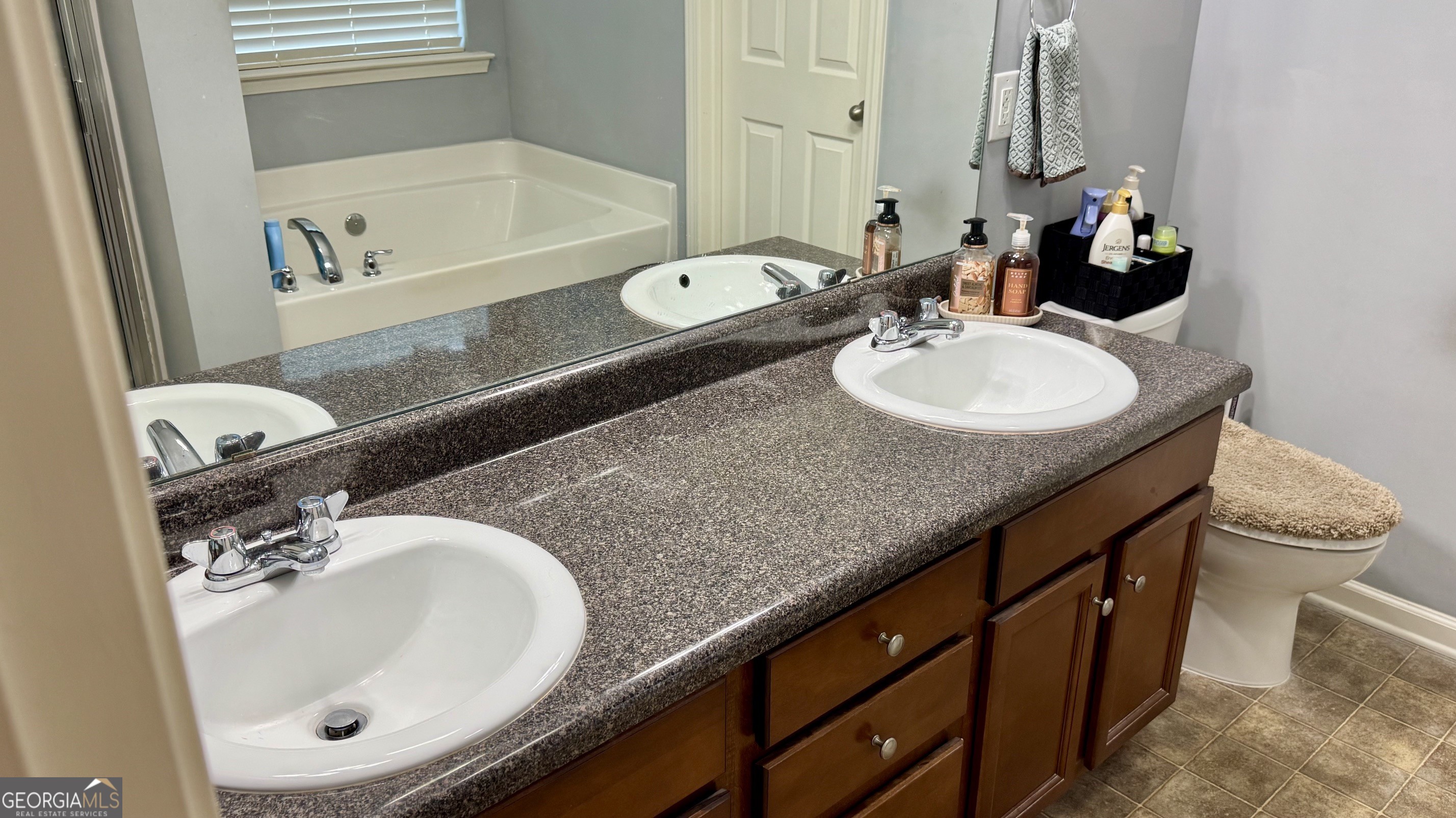 217 Happy Trail Locust Grove, GA 30248 - Photo 15 of 17 Primary bath