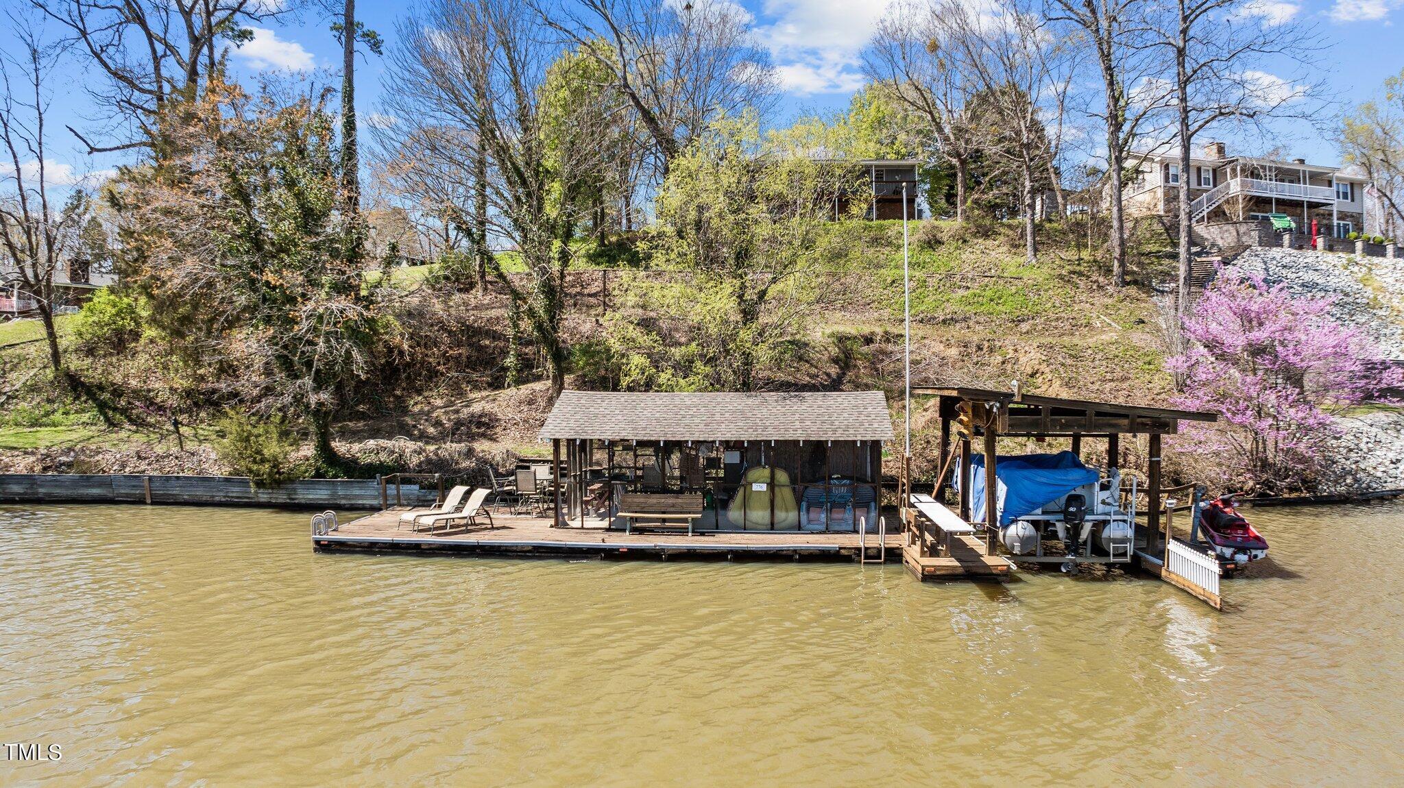 154 Spinnaker Lane, Unit 154 Semora, NC 27343 - Photo 2 of 64 dock from drone