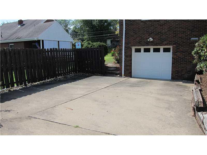 320 McGovern Road Houston, PA 15342 - Photo 4 of 13 Exterior Back. Large driveway for guest parking, and off road on side!