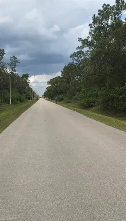 a view of a field and a lake view