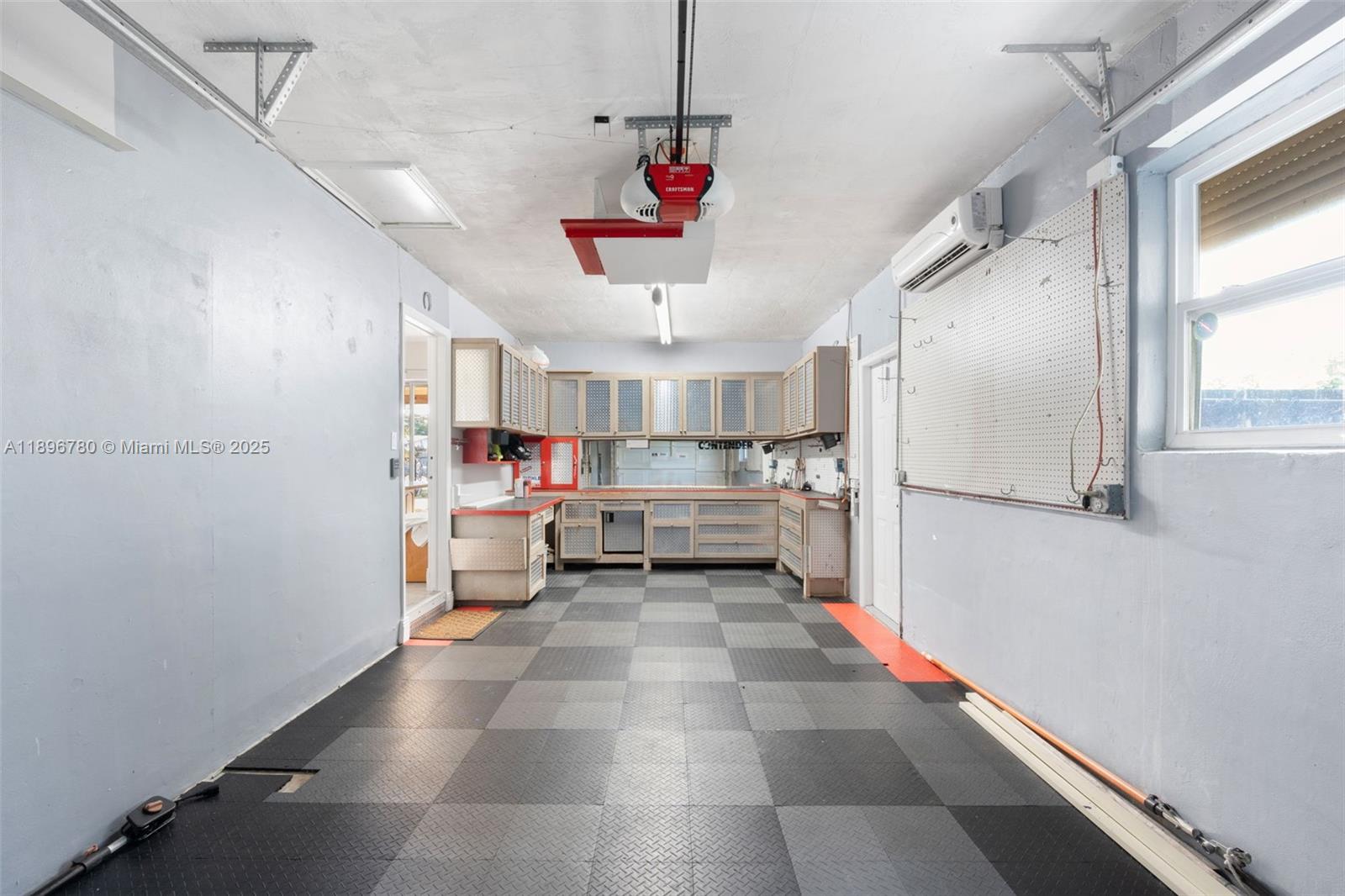 7305 Northwest 95th Way Tamarac, FL 33321 - Photo 11 of 24 a very nice looking room with a window