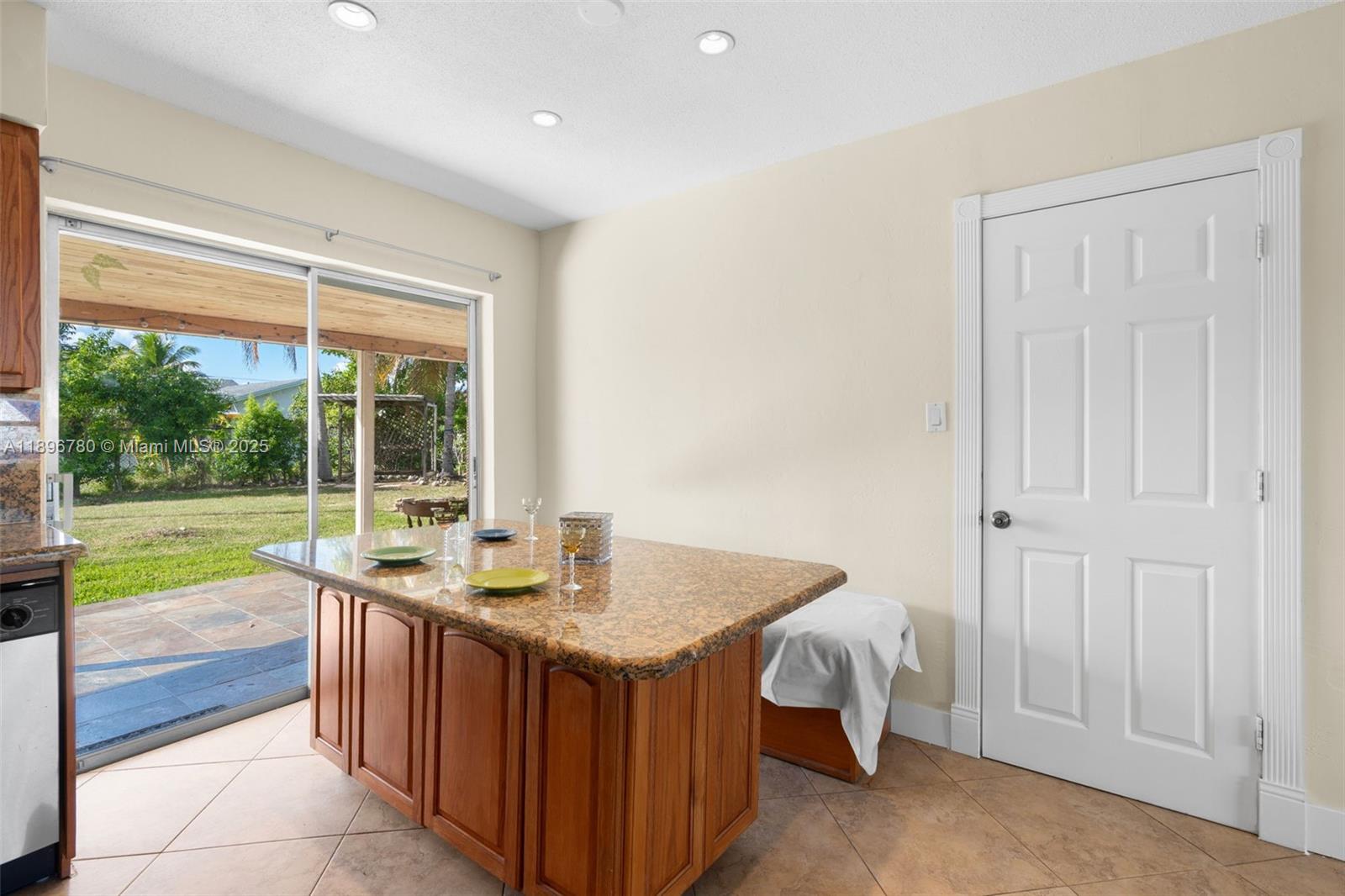7305 Northwest 95th Way Tamarac, FL 33321 - Photo 12 of 24 a bathroom with a sink and a large window