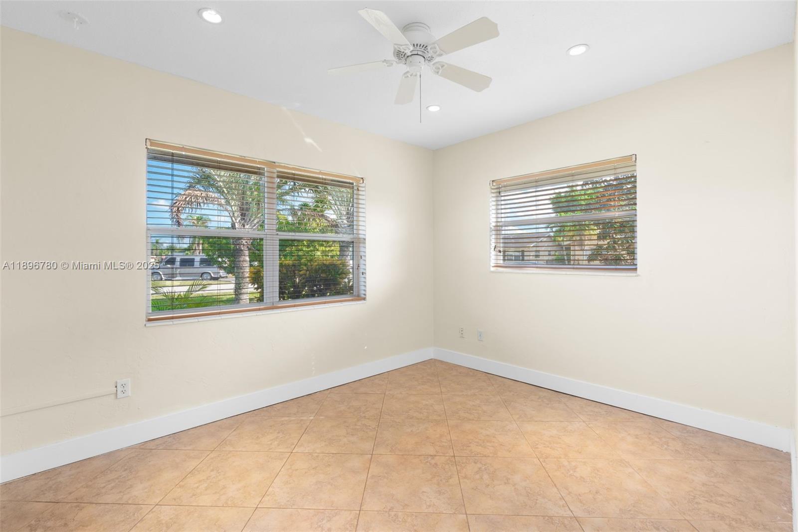7305 Northwest 95th Way Tamarac, FL 33321 - Photo 14 of 24 an empty room with a window