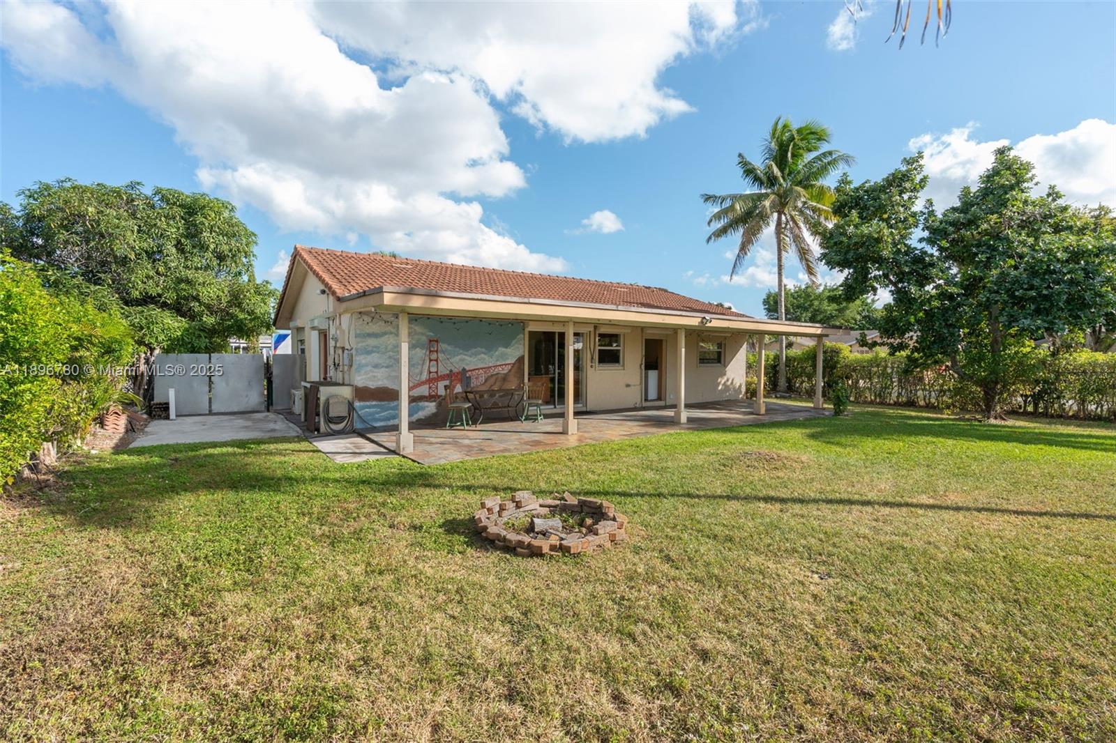 7305 Northwest 95th Way Tamarac, FL 33321 - Photo 24 of 24 a view of a house with a backyard