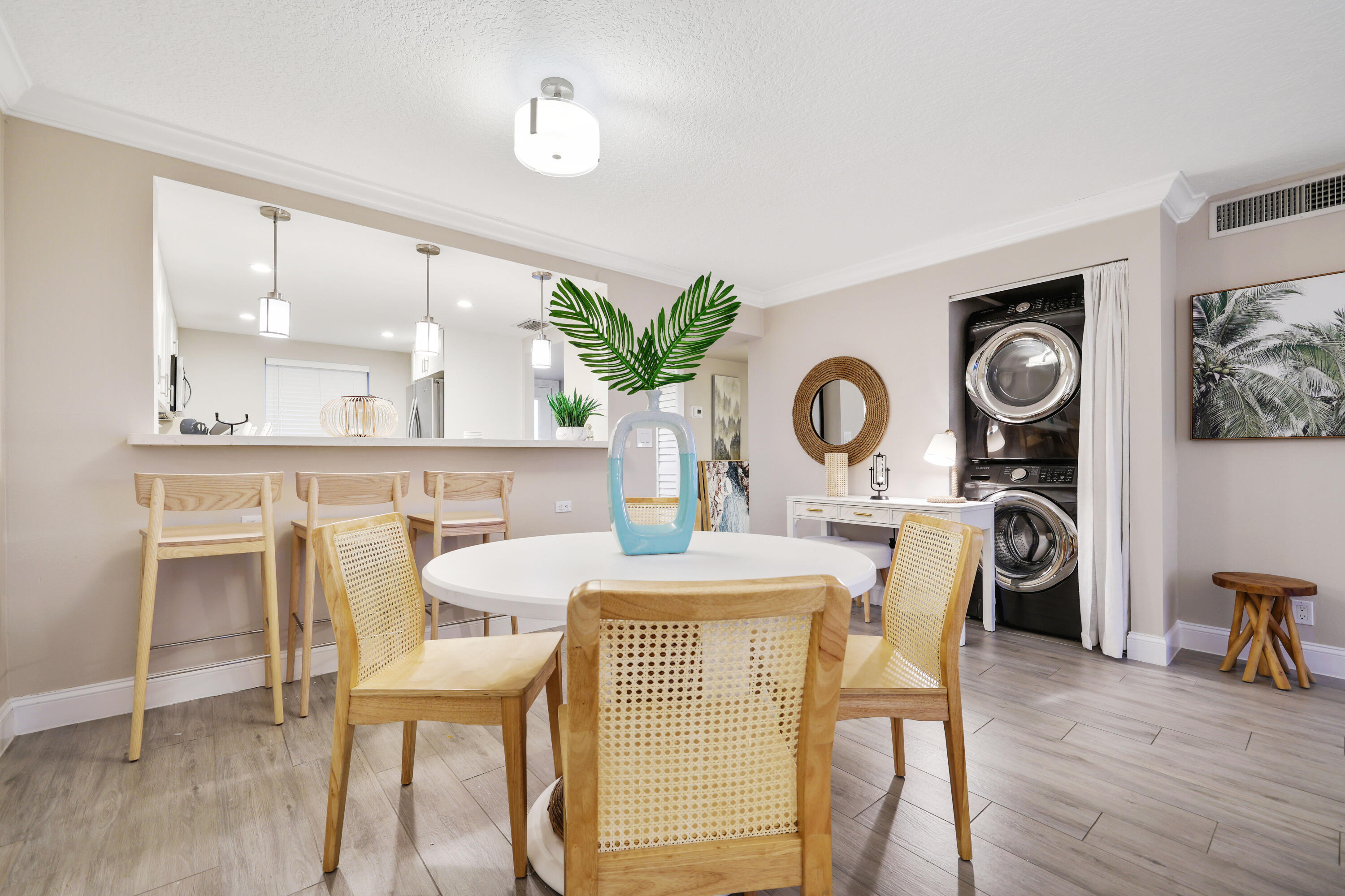 601 North Ocean Boulevard Boca Raton, FL 33432 - Photo 11 of 36 a view of a dining room with furniture and wooden floor