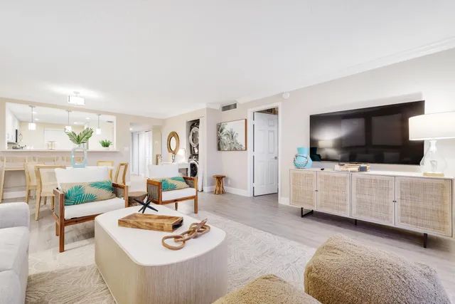 a living room with furniture and a table