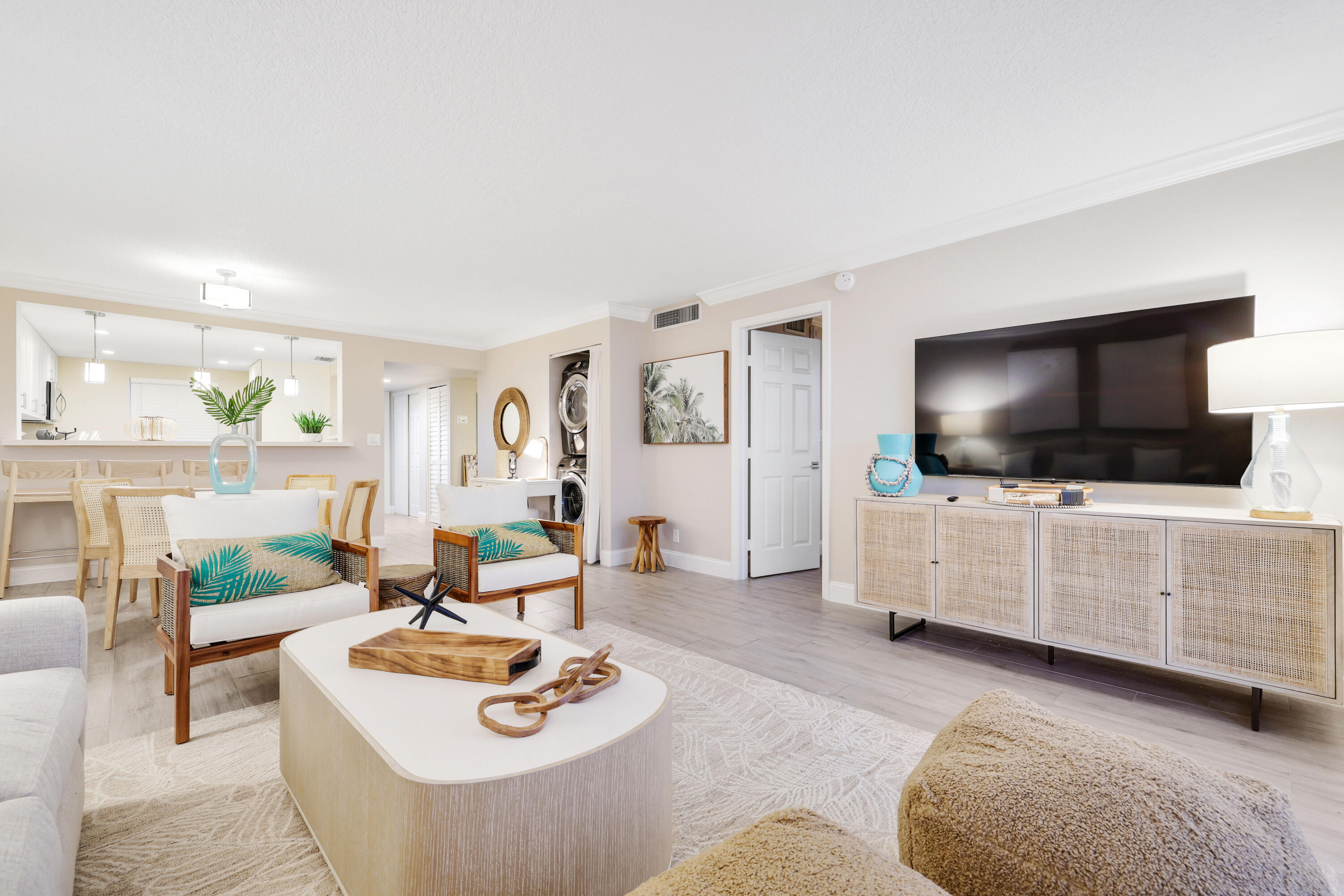 601 North Ocean Boulevard Boca Raton, FL 33432 - Photo 15 of 36 a living room with furniture and a flat screen tv