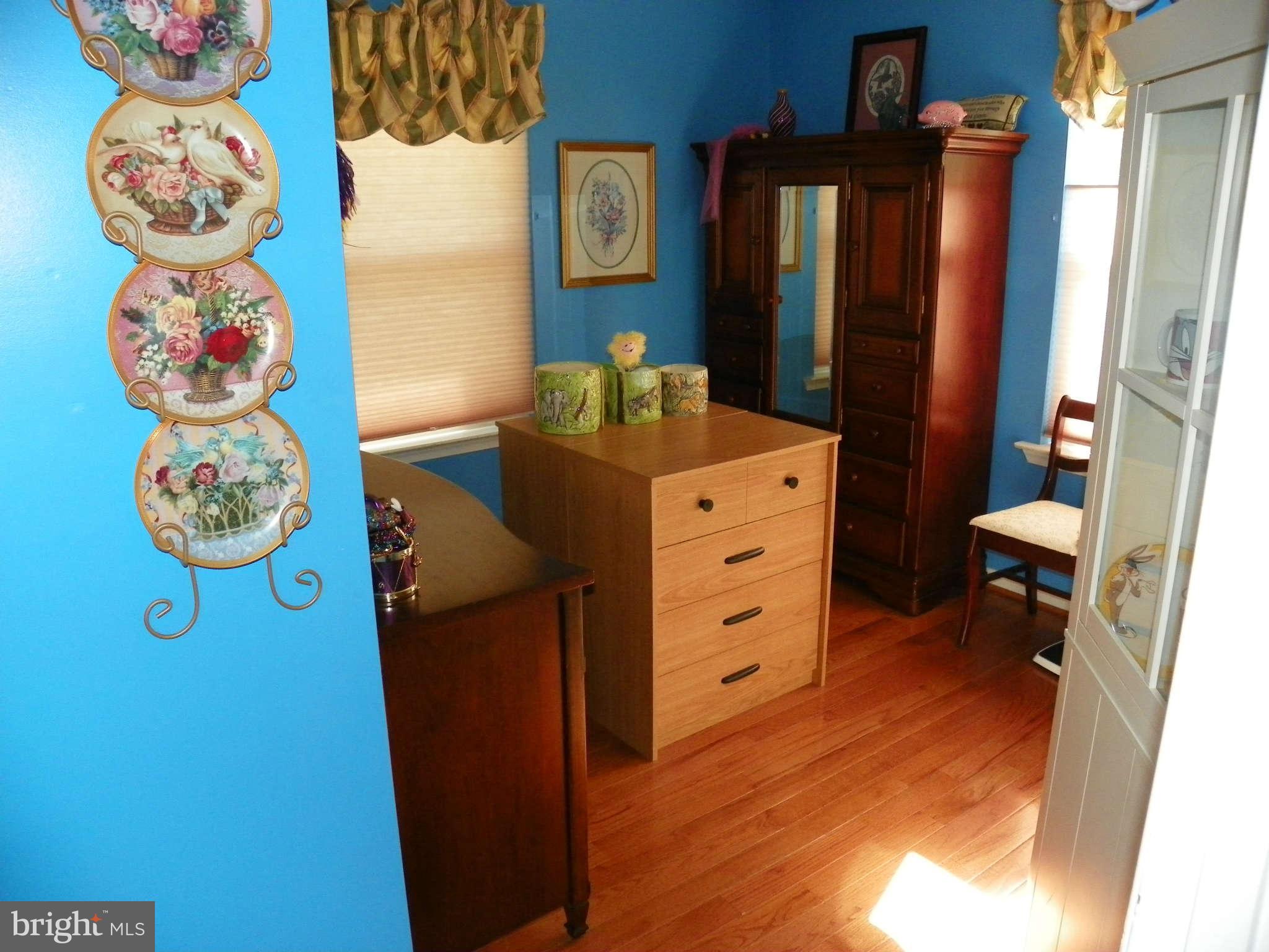 1130 Calvert Beach Road St. Leonard, MD 20685 - Photo 14 of 21 a bathroom with a mirror and a table