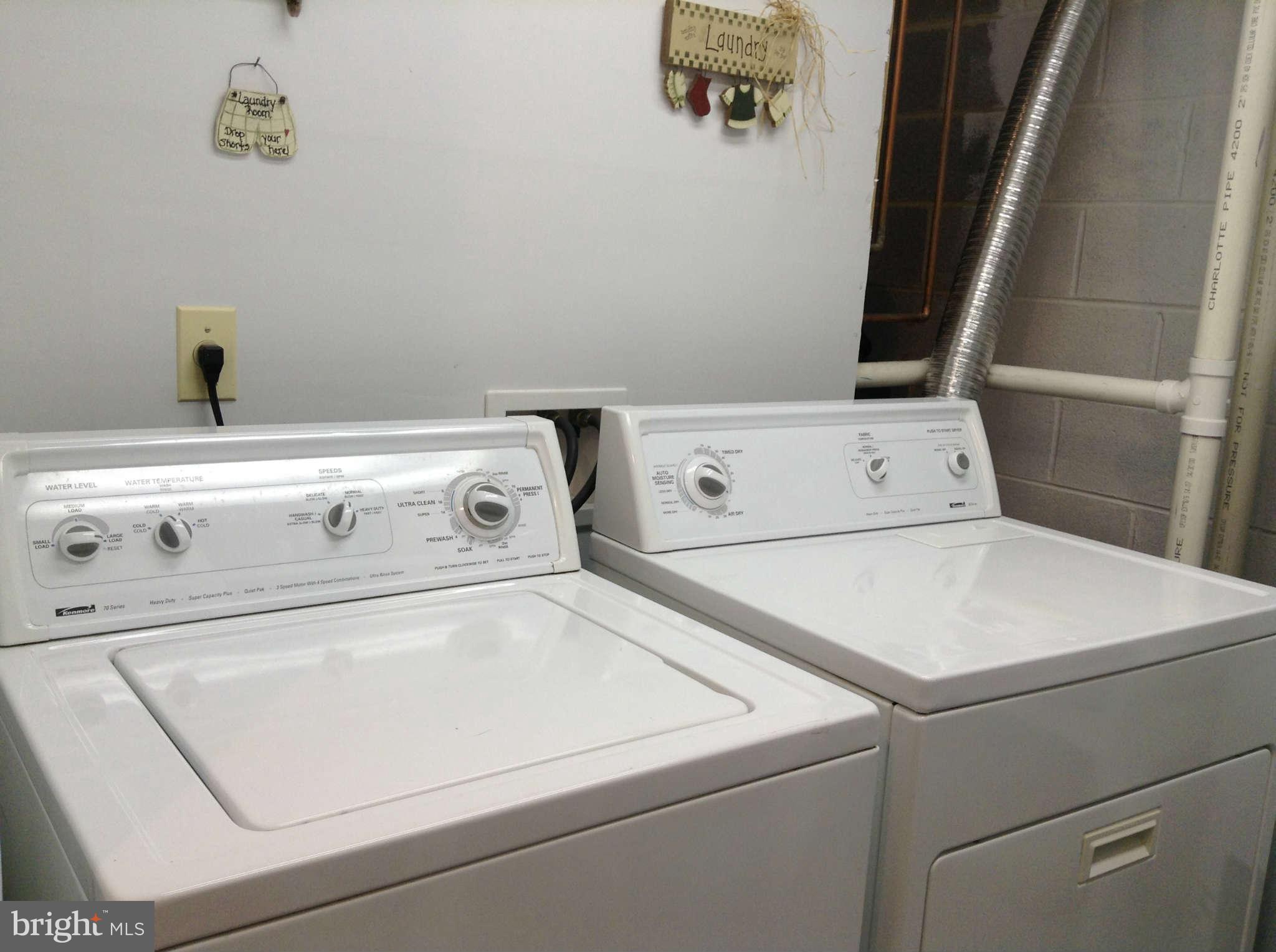 1130 Calvert Beach Road St. Leonard, MD 20685 - Photo 19 of 21 a close up view of washer and dryer