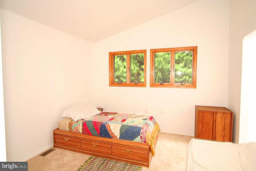 605 Old Point Road Chester, MD 21619 - Photo 24 of 30 a living room with furniture and a window