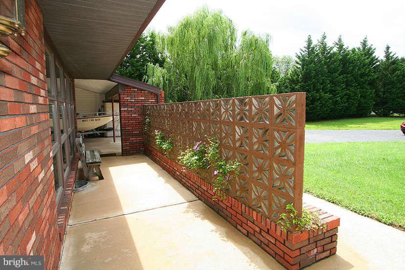 605 Old Point Road Chester, MD 21619 - Photo 8 of 30 a view of outdoor space with garden