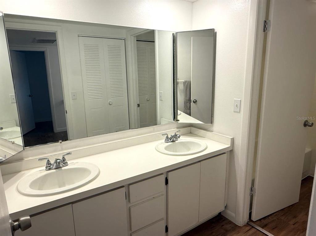 1406 Park Shore Circle, Unit 3 Fort Myers, FL 33901 - Photo 18 of 25 a bathroom with a sink and a mirror