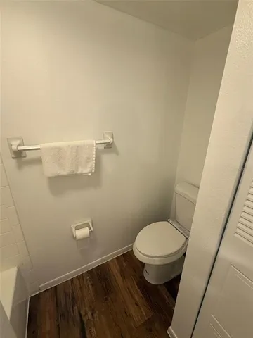 a bathroom with a toilet and a sink