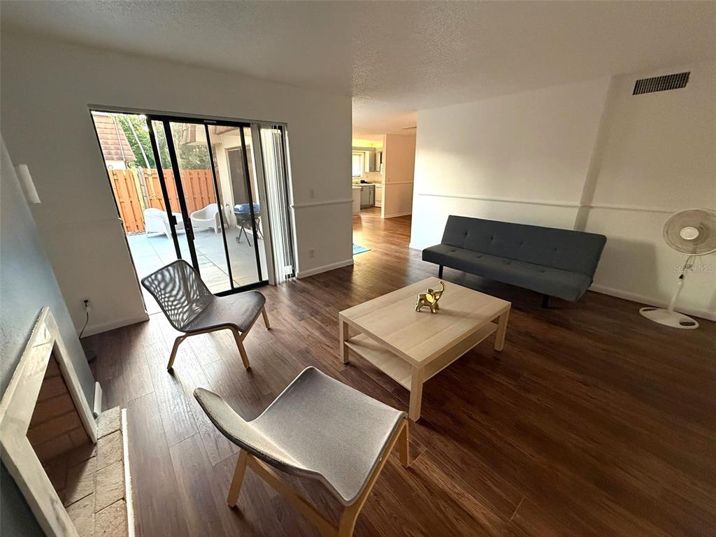 1406 Park Shore Circle, Unit 3 Fort Myers, FL 33901 - Photo 6 of 25 a living room with furniture and a window