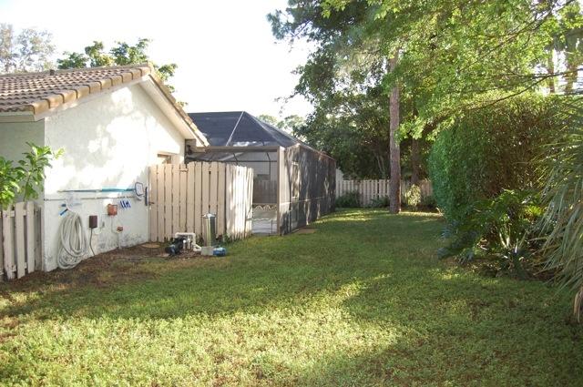 2899 Northwest 24th Court Boca Raton, FL 33431 - Photo 26 of 31 a view of backyard of house