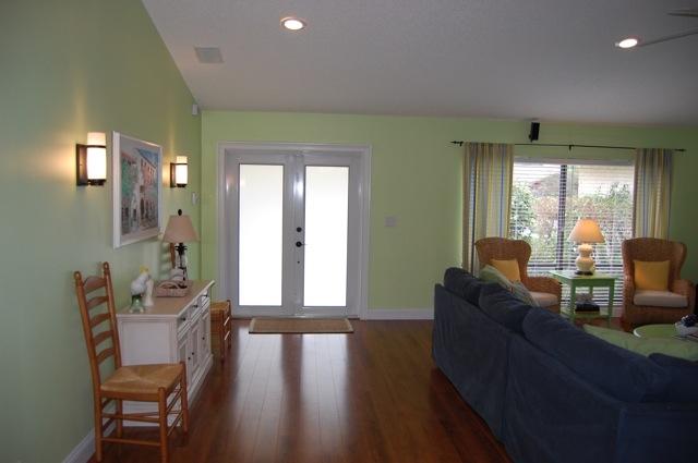 2899 Northwest 24th Court Boca Raton, FL 33431 - Photo 3 of 31 a living room with furniture and wooden floor