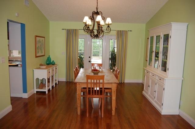 2899 Northwest 24th Court Boca Raton, FL 33431 - Photo 6 of 31 a view of a dining room with furniture window and wooden floor