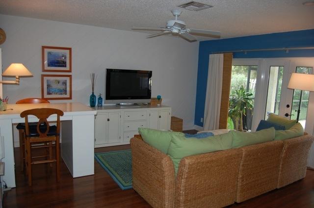 2899 Northwest 24th Court Boca Raton, FL 33431 - Photo 9 of 31 a living room with furniture and a flat screen tv